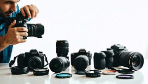 A professional photographer's workspace filled with must-have camera accessories, including lenses, filters, remote controls, and creative tools, symbolizing enhanced creativity and workflow in photography.