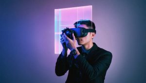 A photographer using a dual-lens camera captures a holographic portrait that merges into a VR headset display, symbolizing the fusion of traditional photography with modern 3D technology for immersive experiences.